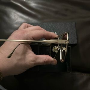 New Prada sunglasses gold worn one no scratches for men or women